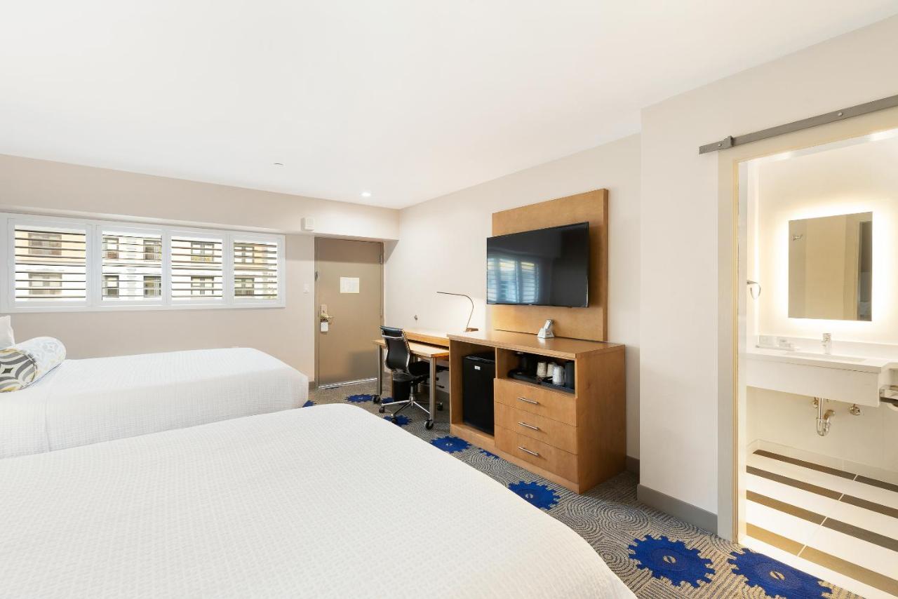 Queen Room with Two Queen Beds at Best Western Red Coach Inn