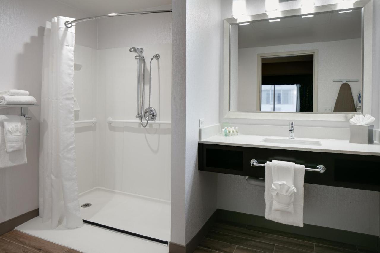 King Suite with Roll-In Shower - Disability Access at Holiday Inn Hotel & Suites Overland Park-West, an IHG Hotel
