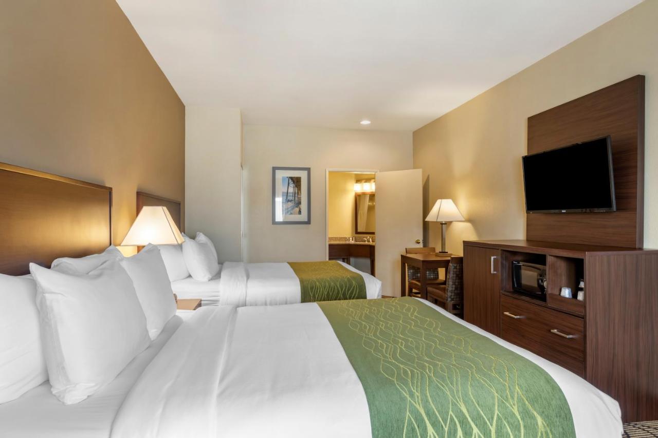 Queen Room with Two Queen Beds with Pool View - Non-Smoking at Comfort Inn & Suites Orange County John Wayne Airport