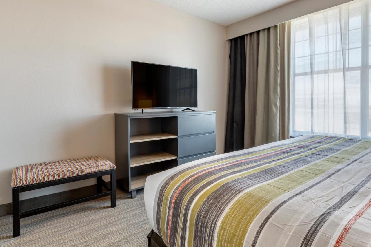 King Suite with Sofa Bed at Country Inn & Suites by Radisson, Lumberton, NC