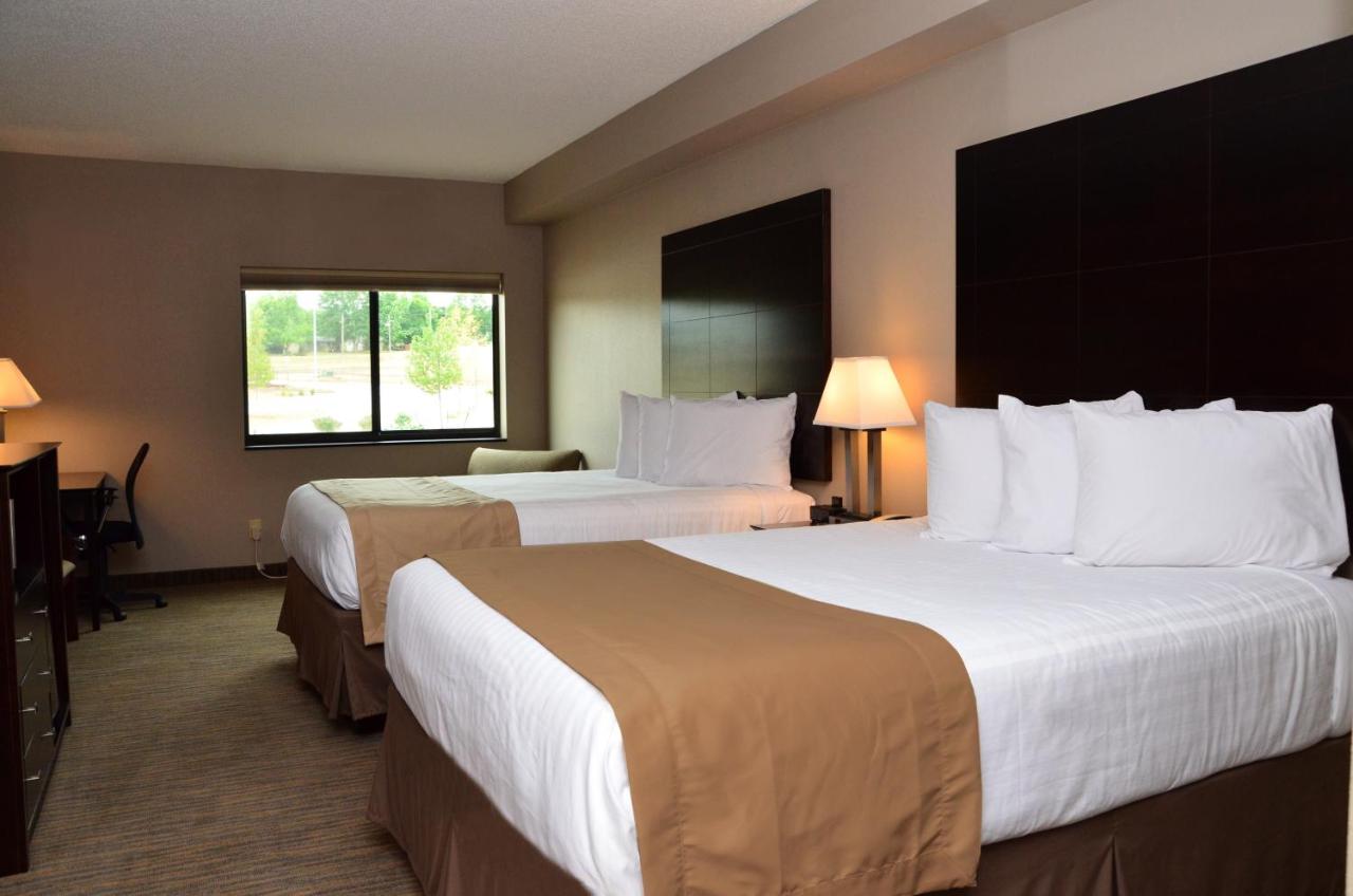 Queen Room with Two Queen Beds at Qube Hotel