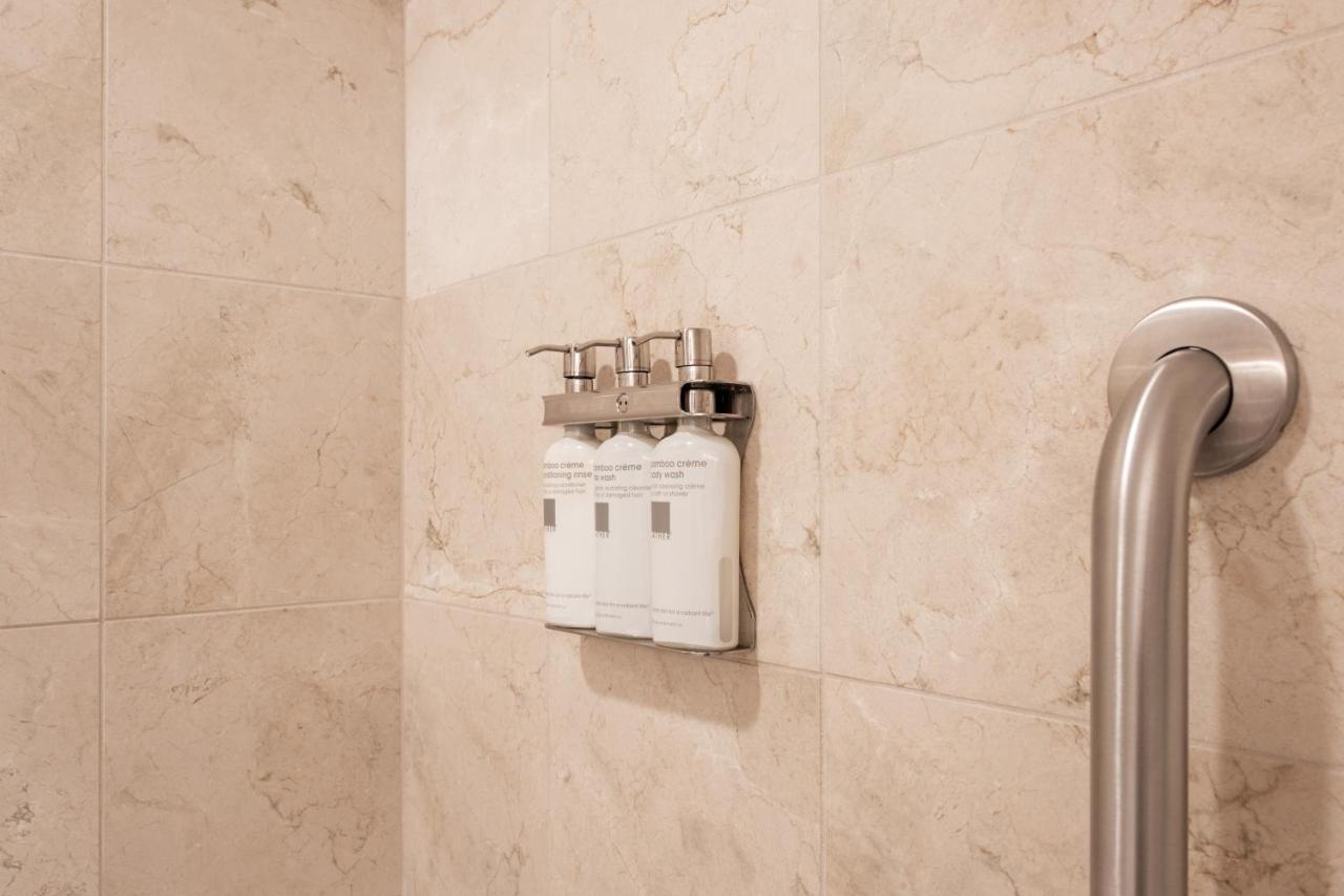 Accessible Queen Room with Roll In Shower at Magnolia Omaha Downtown Old - Market