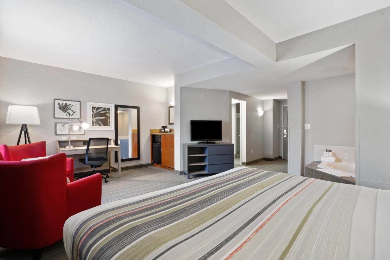 King Suite with Whirlpool - Non-Smoking at Country Inn & Suites by Radisson, Port Canaveral, FL