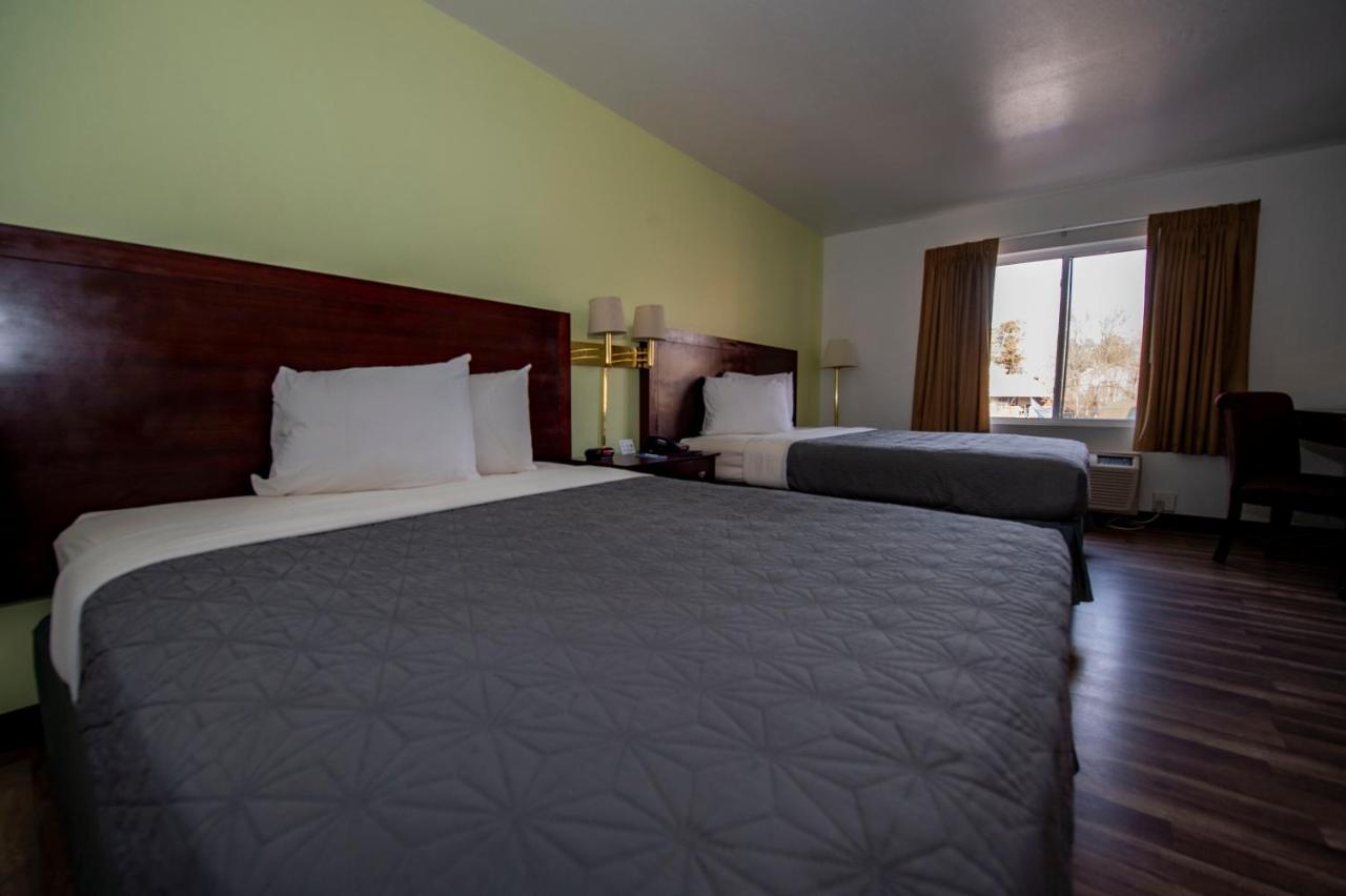 Queen Room with Two Queen Beds - Non-Smoking at Rodeway Inn Central Colorado Springs
