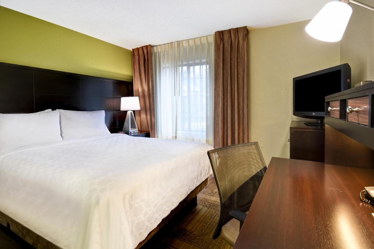 Two-Bedroom Suite with One King and One Queen at Staybridge Suites Grand Rapids-Kentwood by IHG