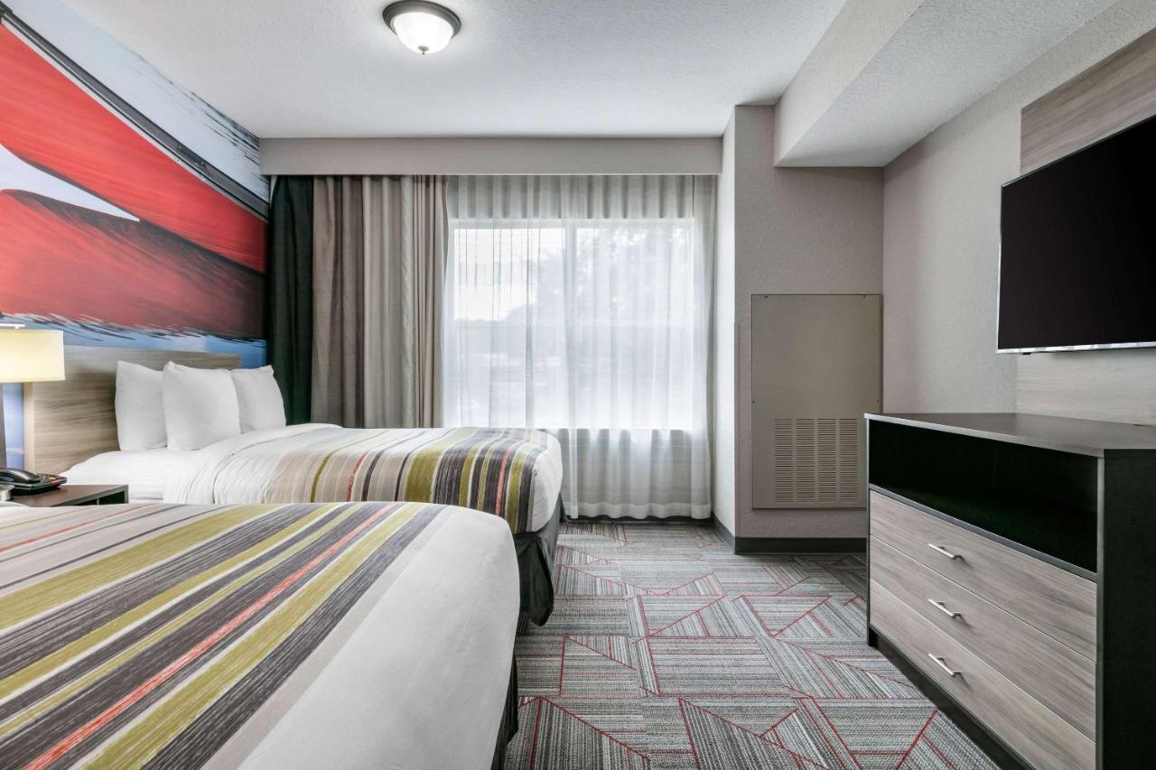 Queen Suite with Two Queen Beds and Sofa Bed - Non-Smoking at Clarion Pointe Columbus-Bradley Park