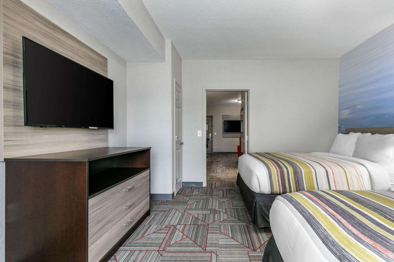 Queen Suite with Two Queen Beds and Sofa Bed - Non-Smoking at Clarion Pointe Columbus-Bradley Park