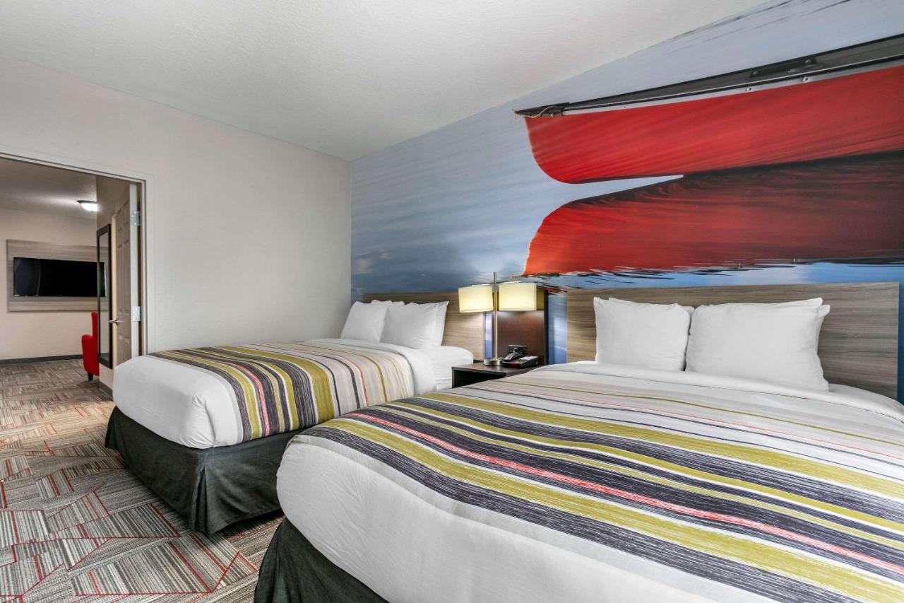 Queen Suite with Two Queen Beds and Sofa Bed - Non-Smoking at Clarion Pointe Columbus-Bradley Park