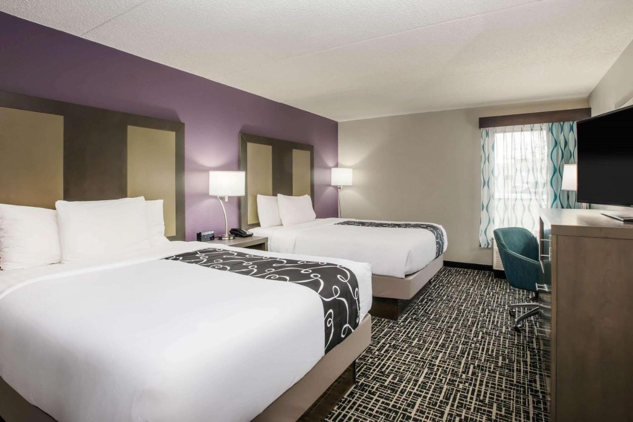 Deluxe Queen Room with Two Queen Beds at La Quinta Inn by Wyndham Davenport & Conference Center