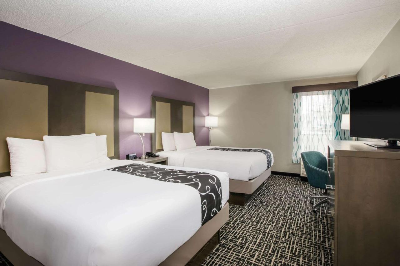 Deluxe Queen Room with Two Queen Beds at La Quinta Inn by Wyndham Davenport & Conference Center