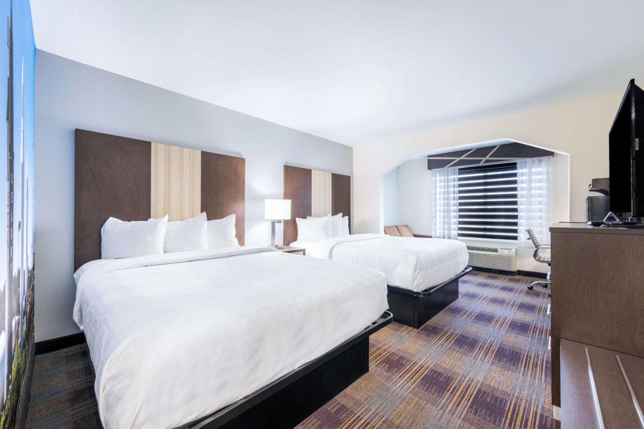 Queen Suite with Two Queen Beds and Sofa Bed - Non-Smoking at Clarion Pointe Madison Huntsville