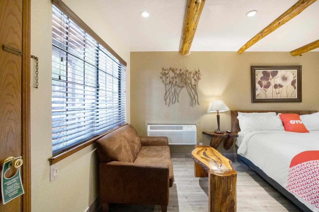 Supreme King Bed with Fireplace - No Pets at Sleepy Hollow Cabins and Hotel