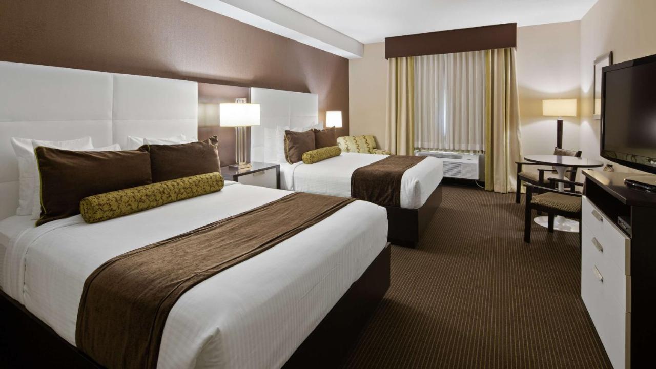 Queen Room with Two Queen Beds and Mobility Accessible Roll-In Shower - Non-Smoking at Best Western Plus Miami Intl Airport Hotel & Suites Coral Gables