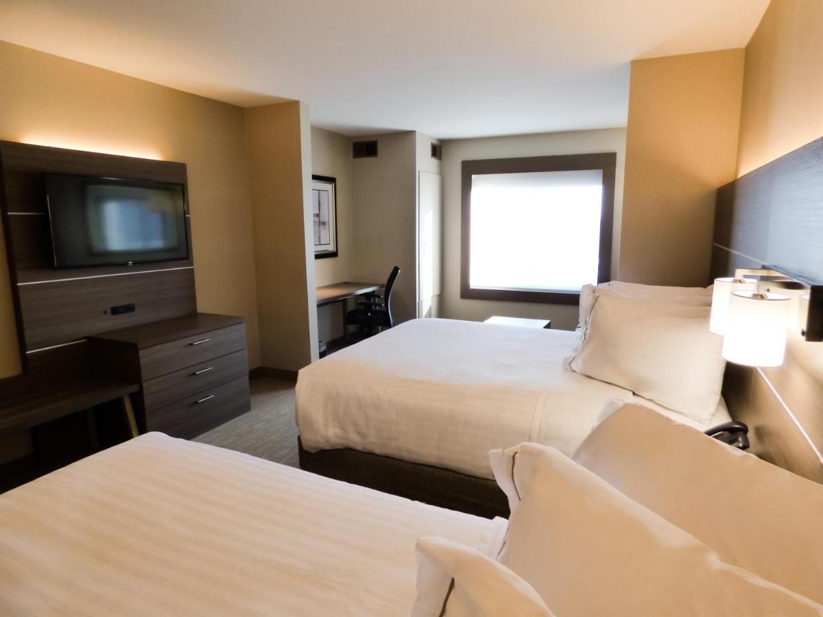 Deluxe Double Room with Two Queen Beds at Holiday Inn Express & Suites Plymouth - Ann Arbor Area, an IHG Hotel