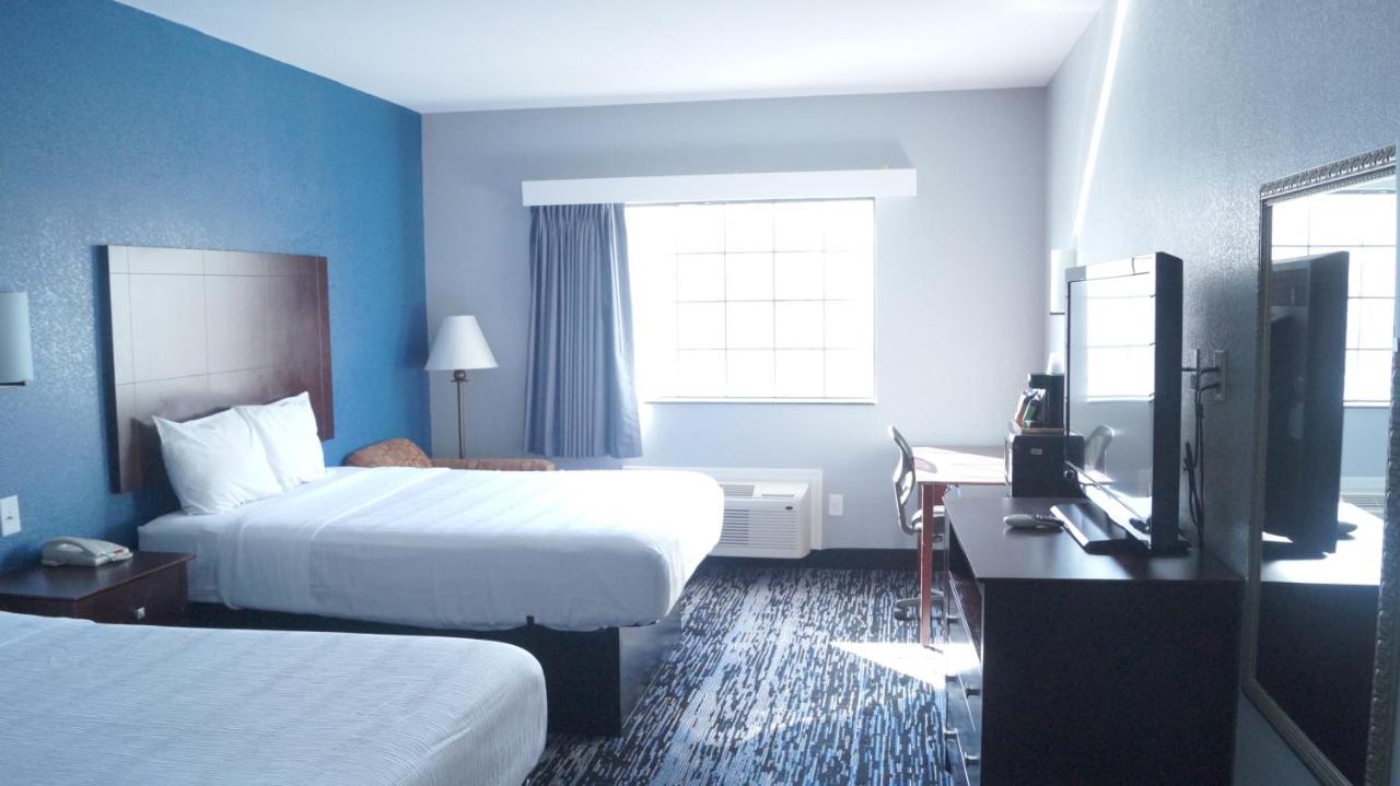 Queen Room with Two Queen Beds at Magnolia Inn and Suites Olive Branch