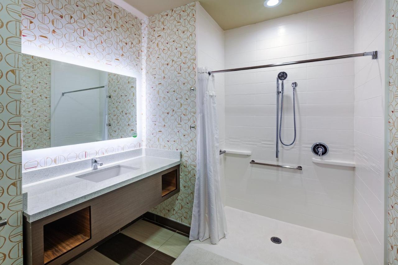 Queen Room with Two Queen Beds and Mobility Accessible Roll-In Shower at Holiday Inn Amarillo East by IHG