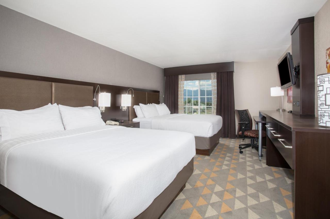 Queen Room with Two Queen Beds at Holiday Inn Colorado Springs Airport, an IHG Hotel