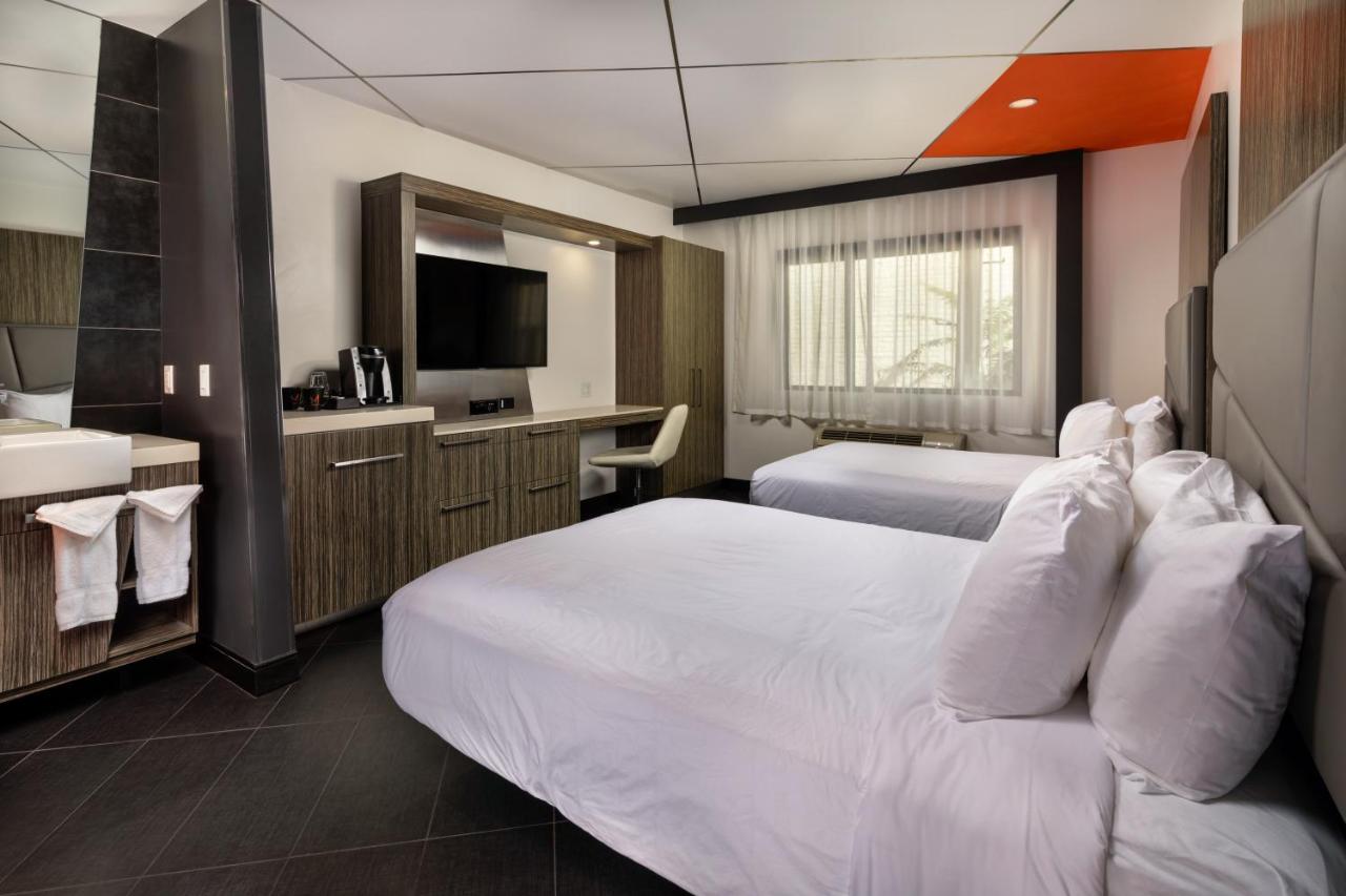 Double Room with Two Double Beds at The Moment Hotel