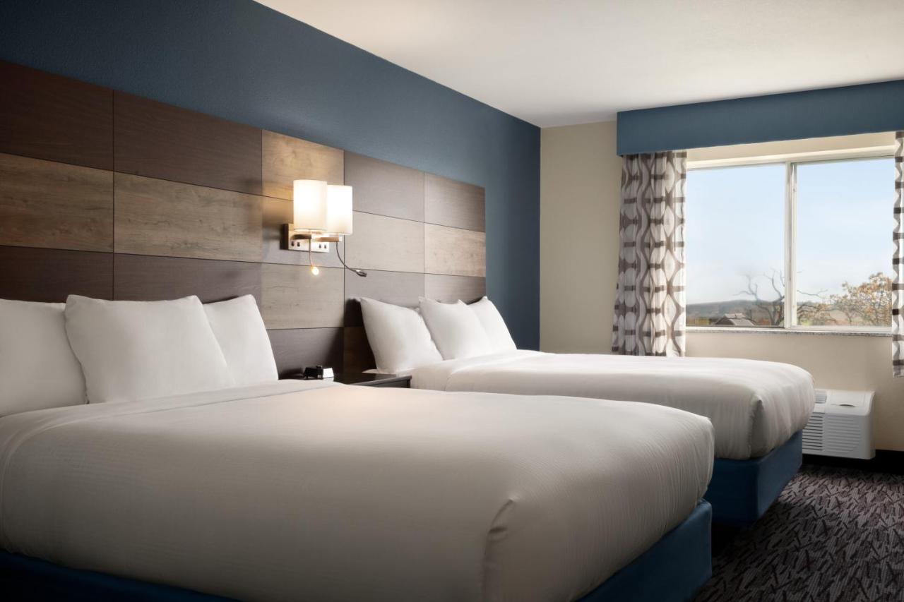 Queen Room with Two Queen Beds - Non-Smoking at AmericInn by Wyndham Dodgeville