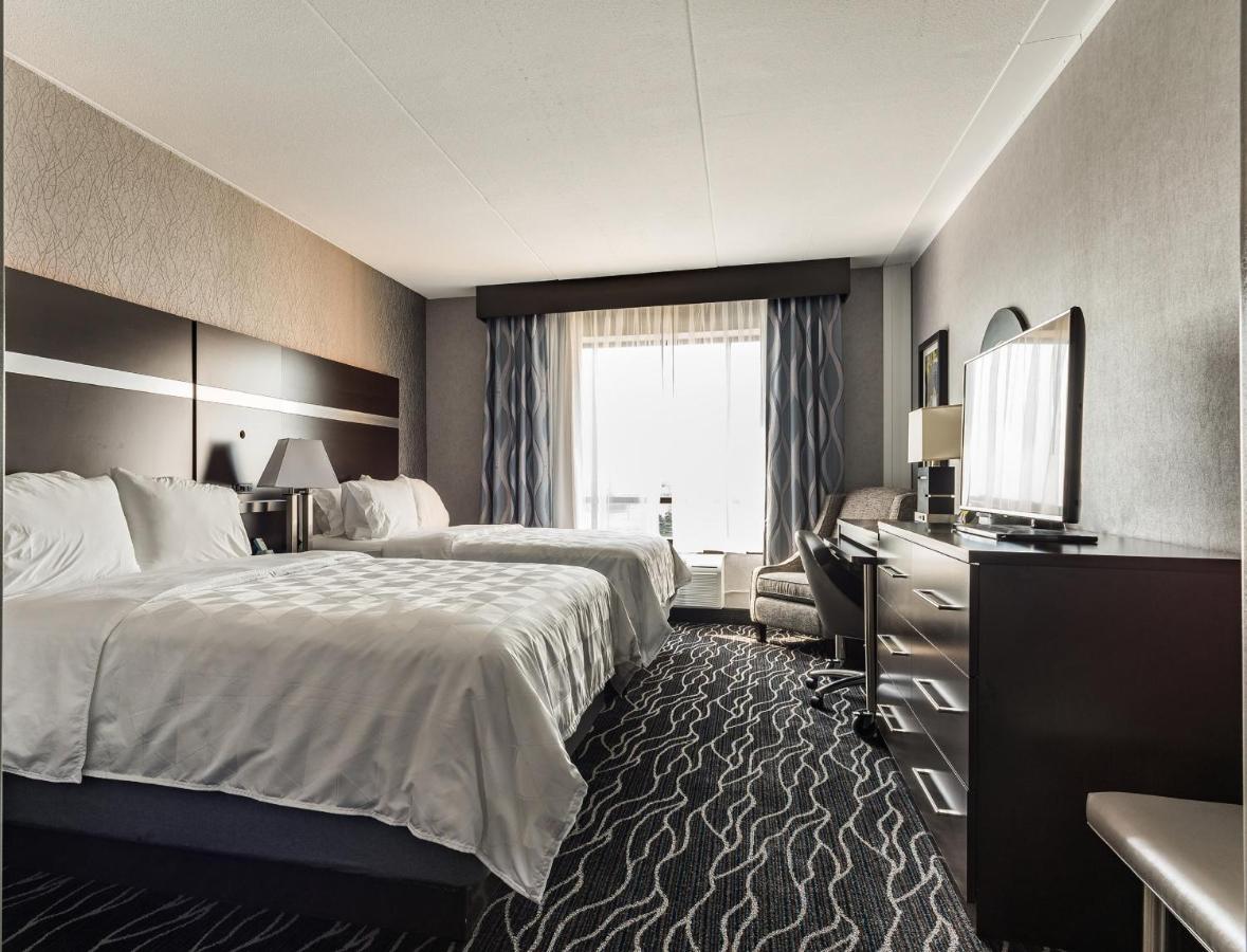 Queen Room with Two Queen Beds - Non-Smoking at Holiday Inn & Suites - Joliet Southwest by IHG