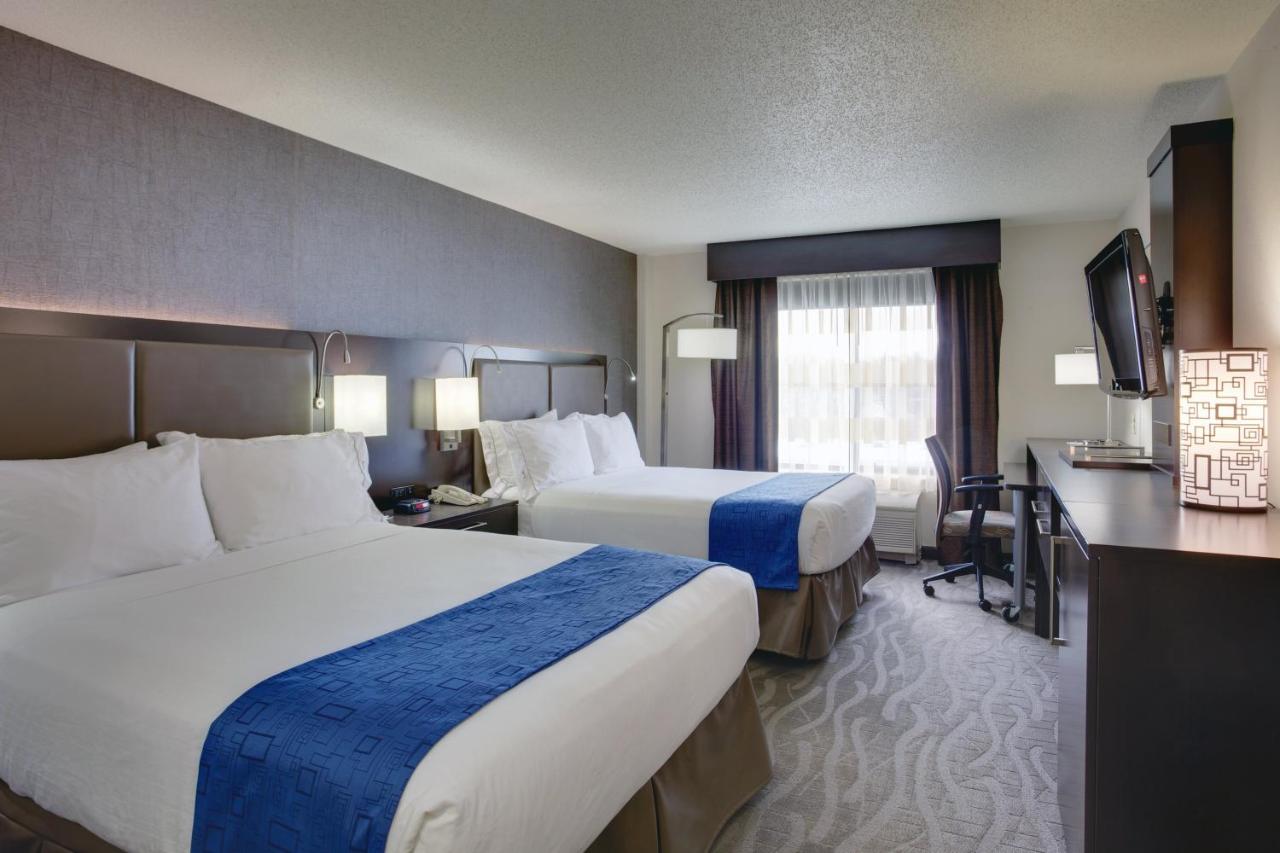 Queen Room with Two Queen Beds - Non-Smoking at Holiday Inn Express Hotel & Suites Meadowlands Area by IHG