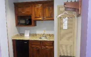 Room #29723031 at SureStay Plus Hotel by Best Western Warner Robins AFB