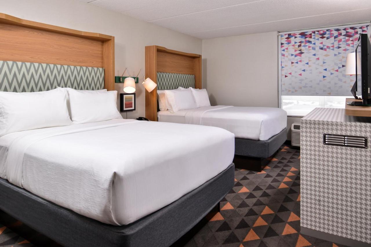 Queen Room with Two Queen Beds at Holiday Inn Hotel & Suites Rochester - Marketplace by IHG
