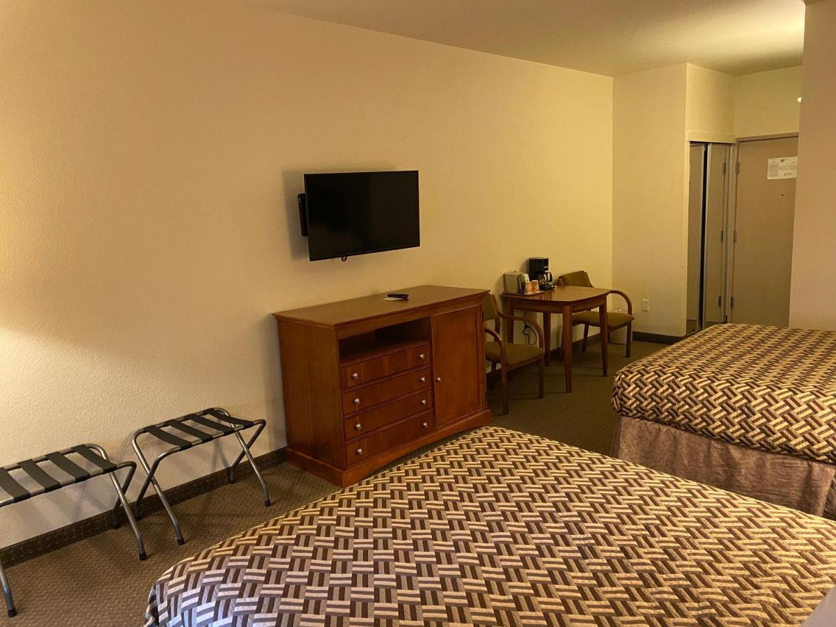 Queen Room with Two Queen Beds - Non-Smoking at A Riverside Inn Travelodge by Wyndham