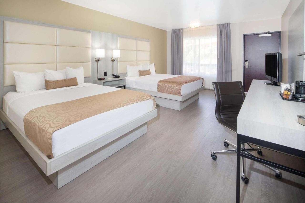 Queen Room with Two Queen Beds and Mobility/Hearing Access - Non-Smoking at Ramada by Wyndham Burbank Airport