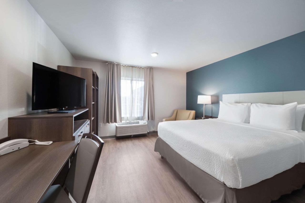 Queen Room - Accessible/Non-Smoking at WoodSpring Suites Dallas Plano Central Legacy Drive