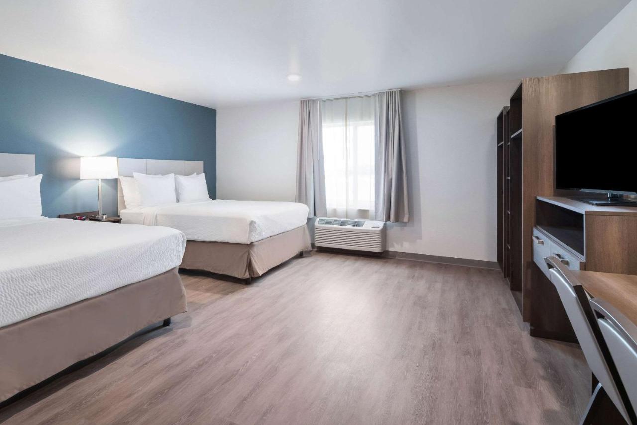 Queen Room with Two Queen Beds - Accessible/Non-Smoking at WoodSpring Suites Dallas Plano Central Legacy Drive