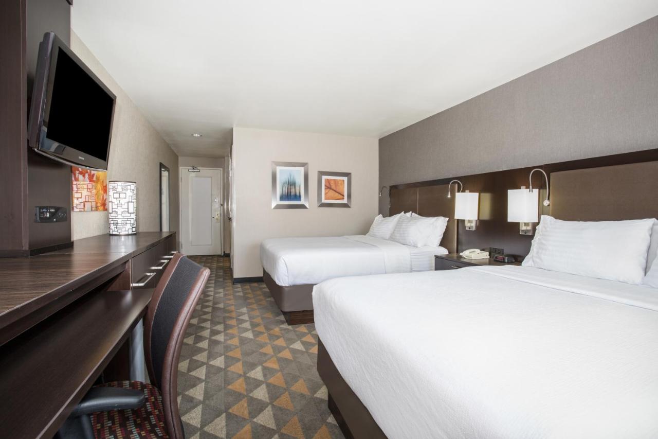 Queen Room with Two Queen Beds - Hearing Accessible/Non-Smoking at Holiday Inn Colorado Springs Airport, an IHG Hotel