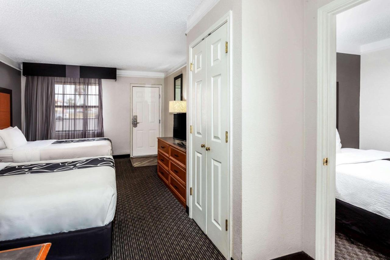 Room with Three Full Beds - Non Smoking at La Quinta Inn by Wyndham Laredo I-35