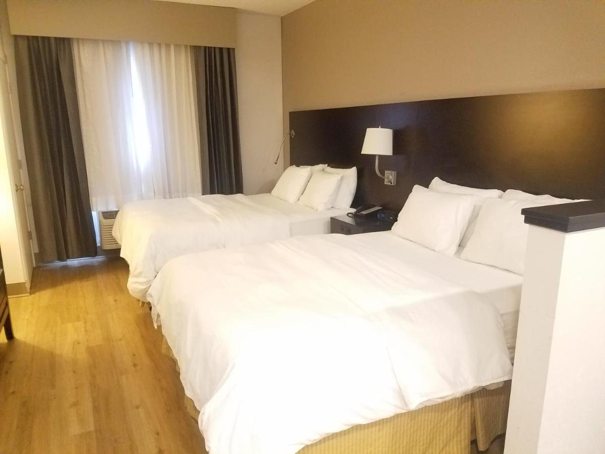 Queen Room with Two Queen Beds at Radisson Hotel and Conference Center Rockford
