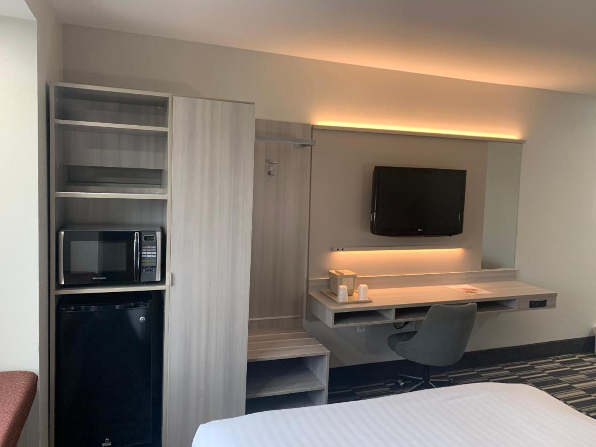 Queen Room with Two Queen Beds - Non-Smoking at Microtel Inn by Wyndham Charlotte Airport