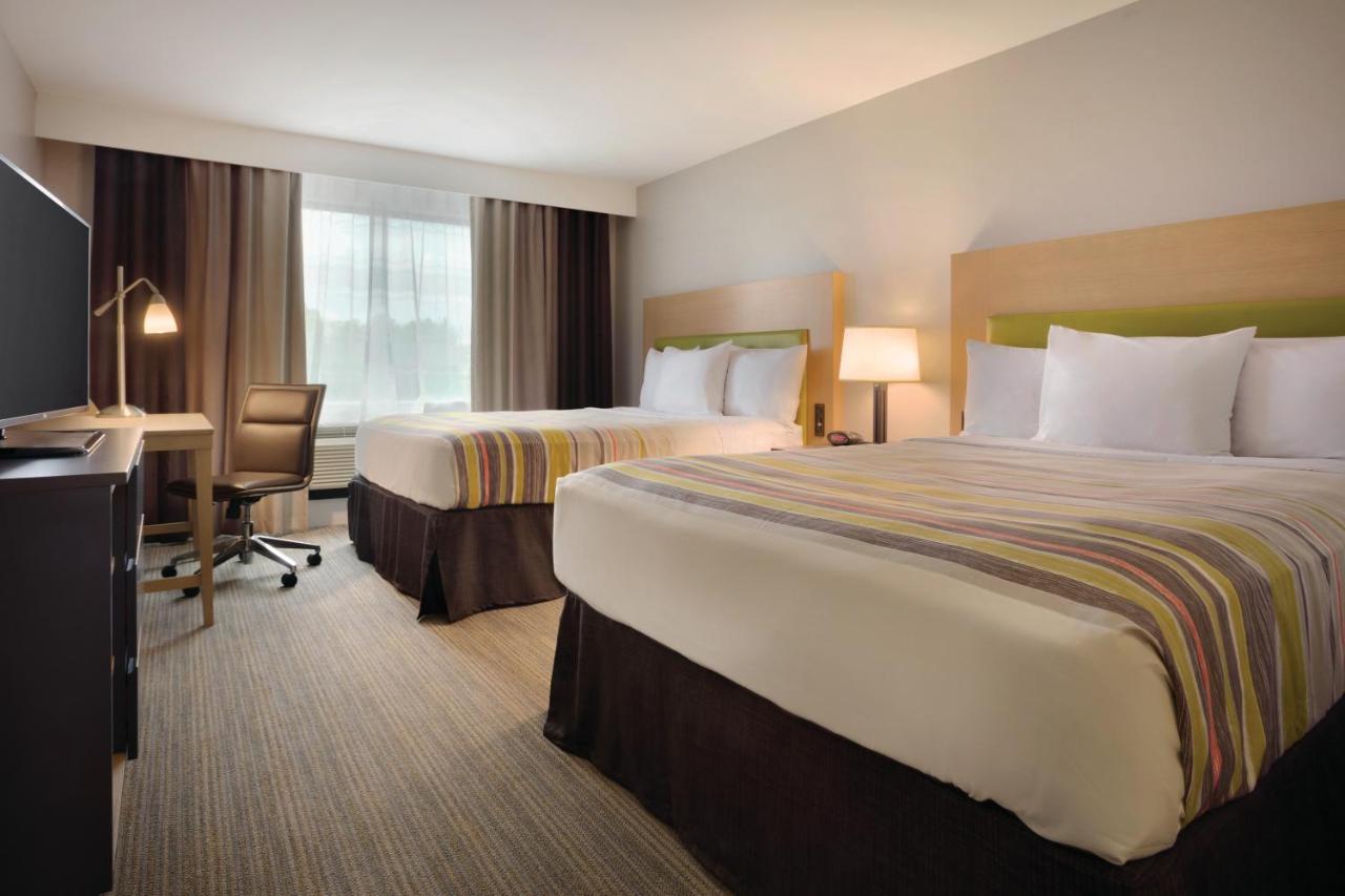 Queen Room with Two Queen Beds at Country Inn & Suites by Radisson, Greensboro, NC