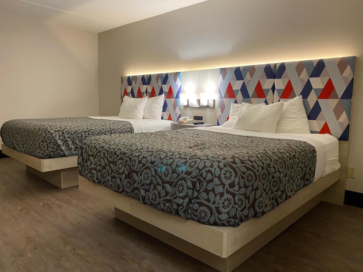 Queen Room with Two Queen Beds - Non-Smoking at Days Inn & Suites by Wyndham Norcross