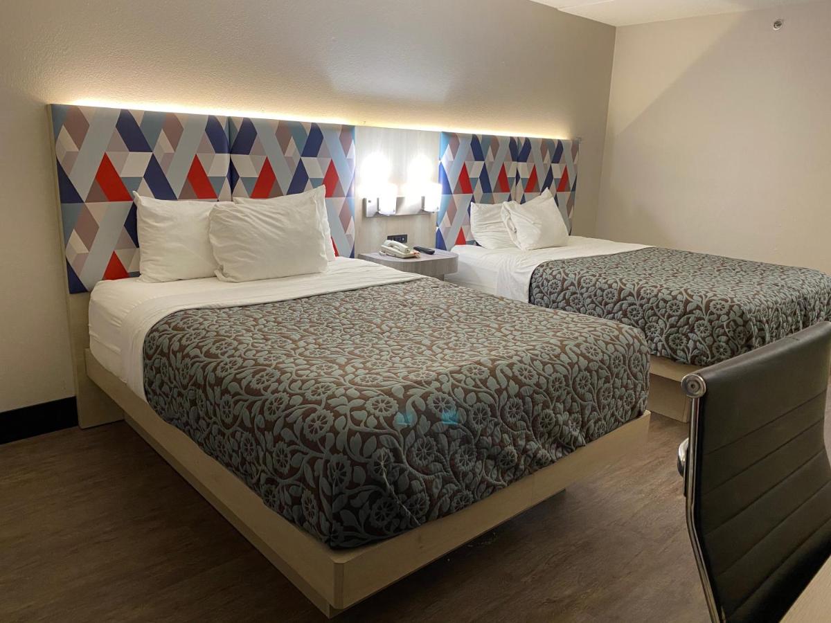 Queen Room with Two Queen Beds - Non-Smoking at Days Inn & Suites by Wyndham Norcross