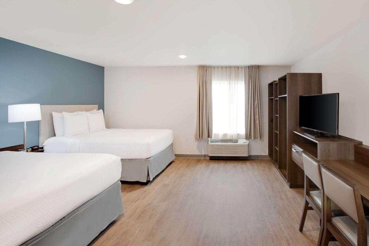Standard Queen Room with Two Queen Beds - Non-Smoking at WoodSpring Suites Plano - North Dallas