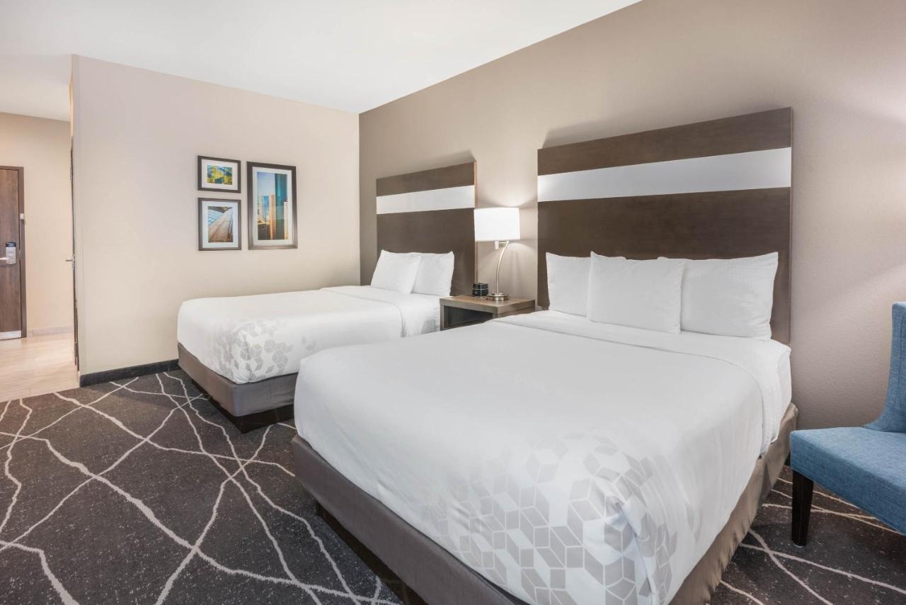 Queen Room with Two Queen Beds - Non-Smoking at La Quinta Inn and Suites by Wyndham Houston Spring South