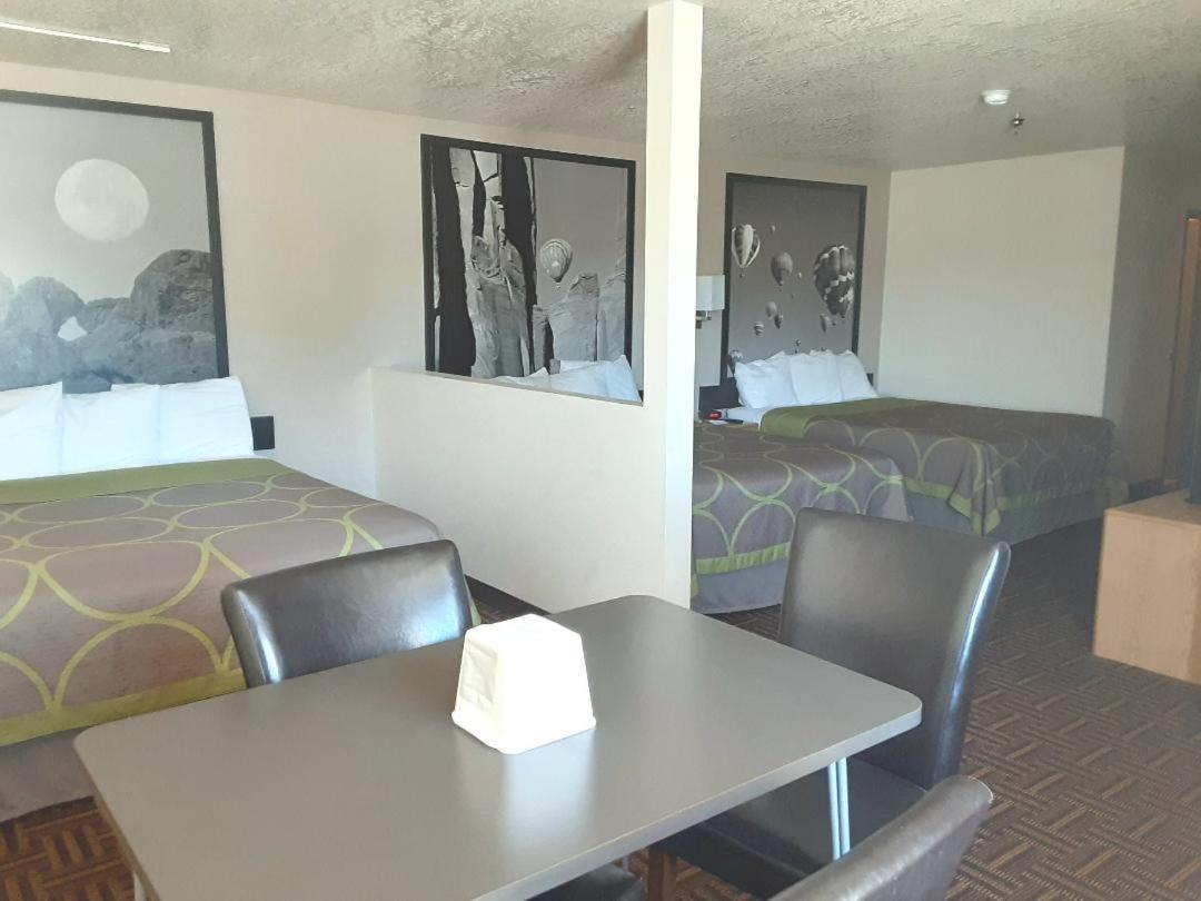 Queen Room with Three Queen Beds - Non-Smoking at Super 8 by Wyndham Bloomfield
