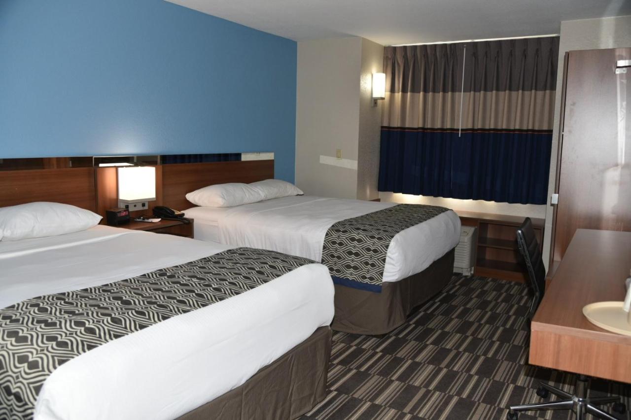 Queen Room with Two Queen Beds - Non-Smoking at Microtel Inn & Suites by Wyndham Fond Du Lac