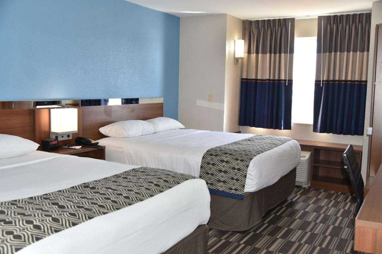 Queen Room with Two Queen Beds - Non-Smoking at Microtel Inn & Suites by Wyndham Fond Du Lac