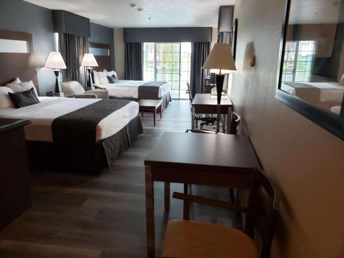 King Room with Two King Beds and Balcony at Best Western Americana