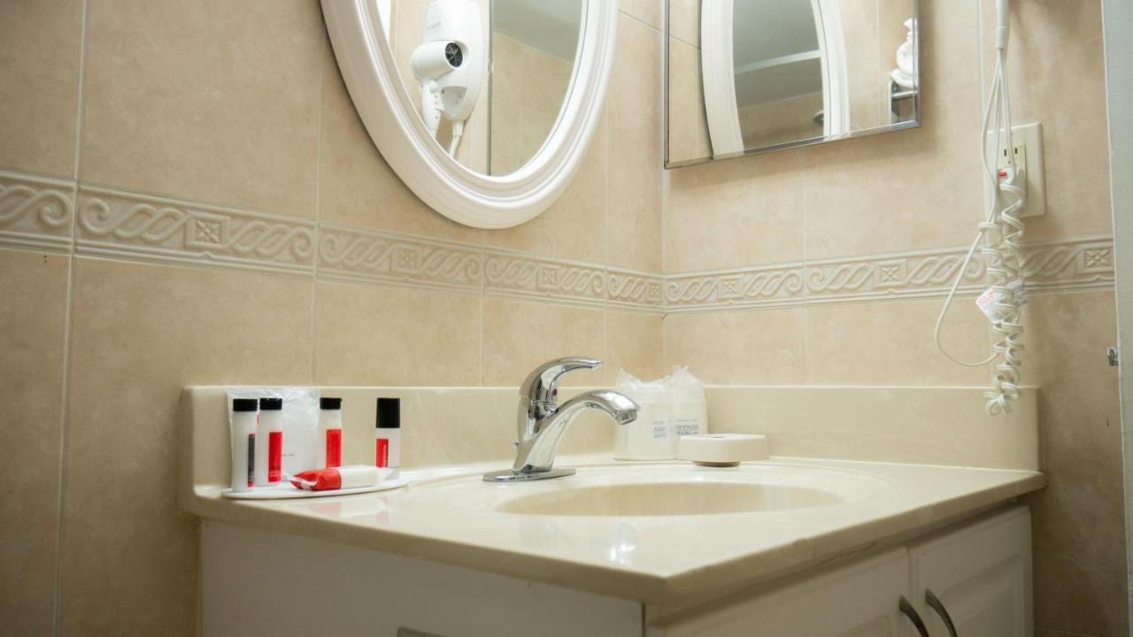 2 Queen Beds, Deluxe Room, Partial View, Kitchenette, Non-Smoking at Ramada Plaza by Wyndham Marco Polo Beach Resort