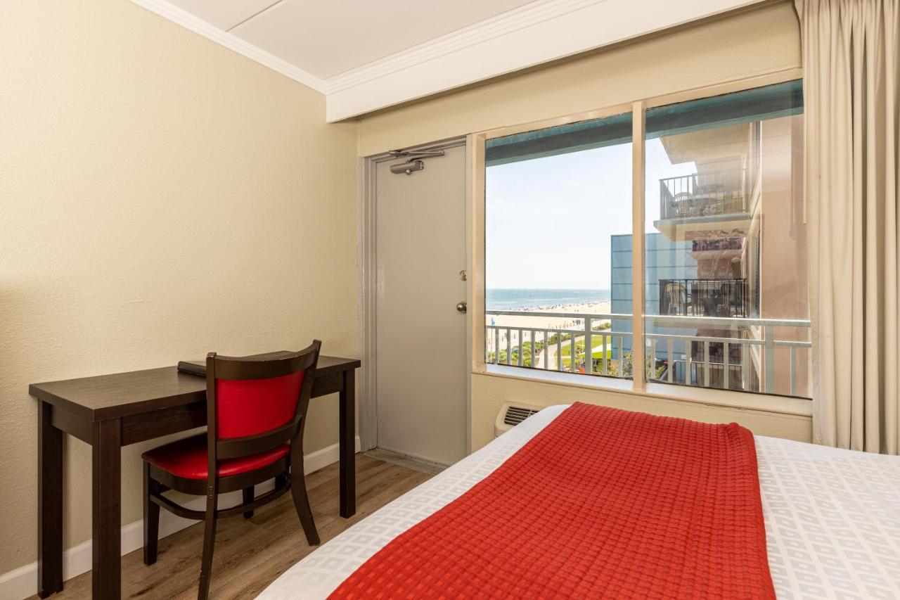 Room with Two Double Beds - Partial Ocean View at Sandcastle Resort On The Beach