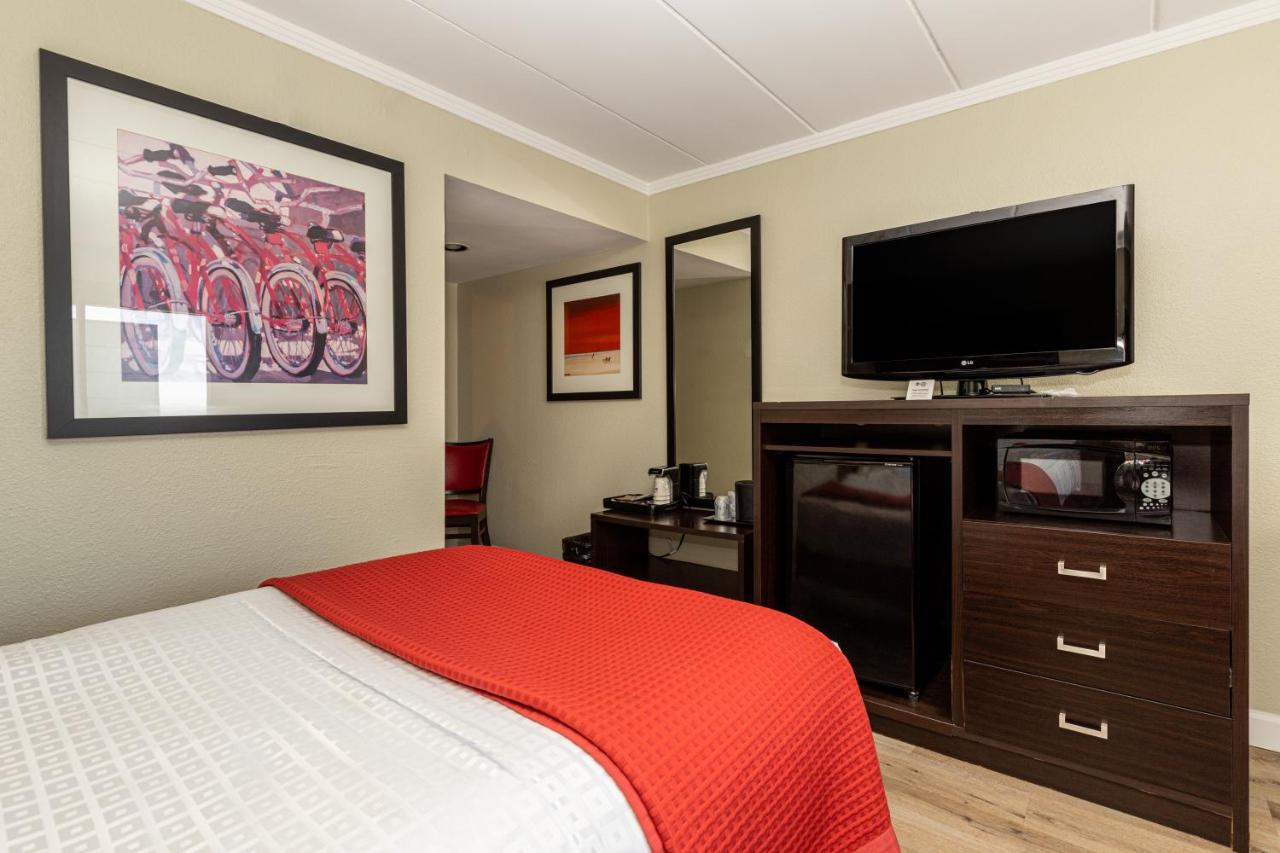 Room with Two Double Beds - Partial Ocean View at Sandcastle Resort On The Beach