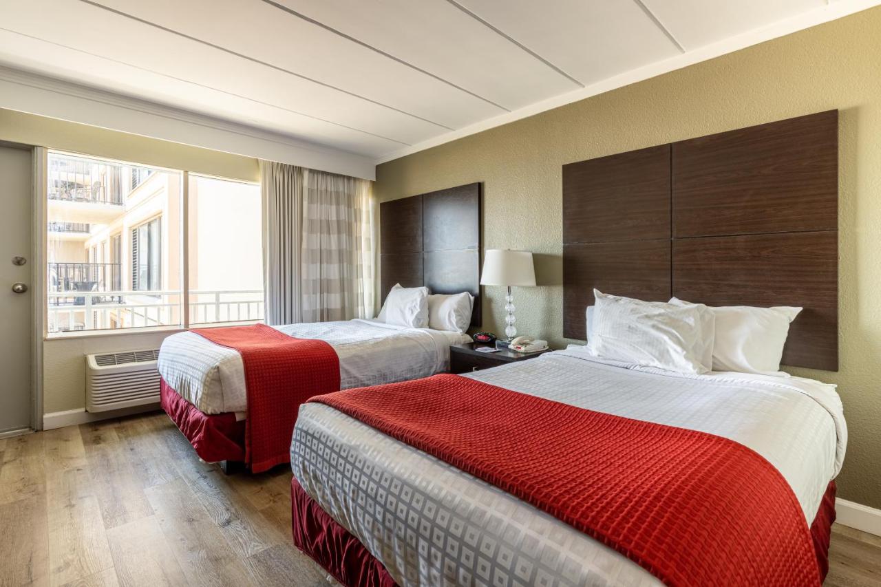 Room with Two Double Beds - Partial Ocean View at Sandcastle Resort On The Beach