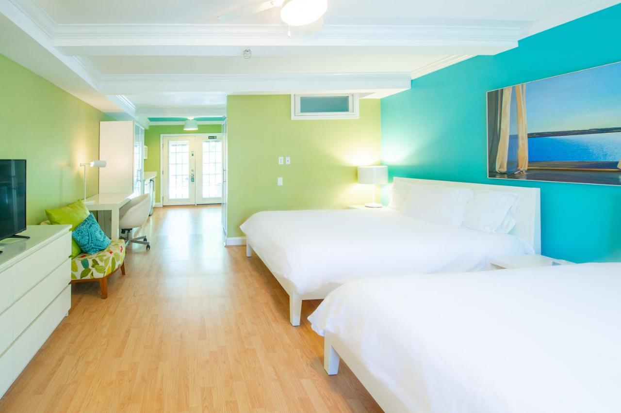 Quadruple Room with Balcony at Canalside Inn