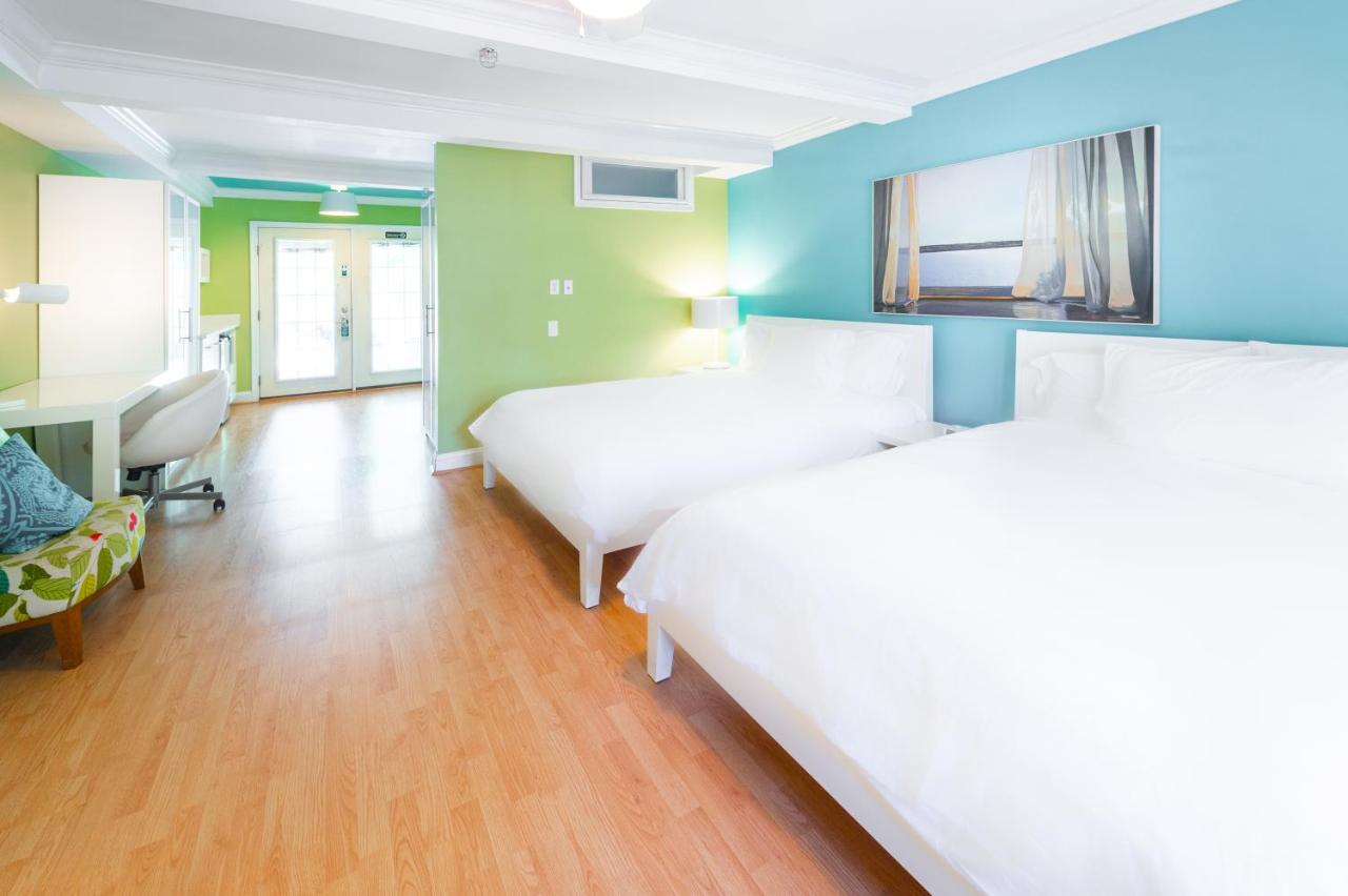 Quadruple Room with Balcony at Canalside Inn